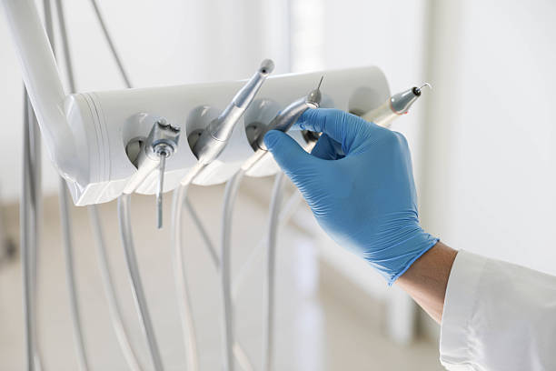 Professional Tooth Extraction technician working in Alexandria, IN